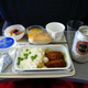 Image for article titled Airplane food tastes bad because your brain can't handle the noise